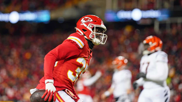 Jan 29, 2023; Kansas City, Missouri, USA; Kansas City Chiefs cornerback Jaylen Watson (35) reacts after making an interception against the Cincinnati Bengals during the second quarter of the AFC Championship game at GEHA Field at Arrowhead Stadium. Mandatory Credit: Jay Biggerstaff-USA TODAY Sports